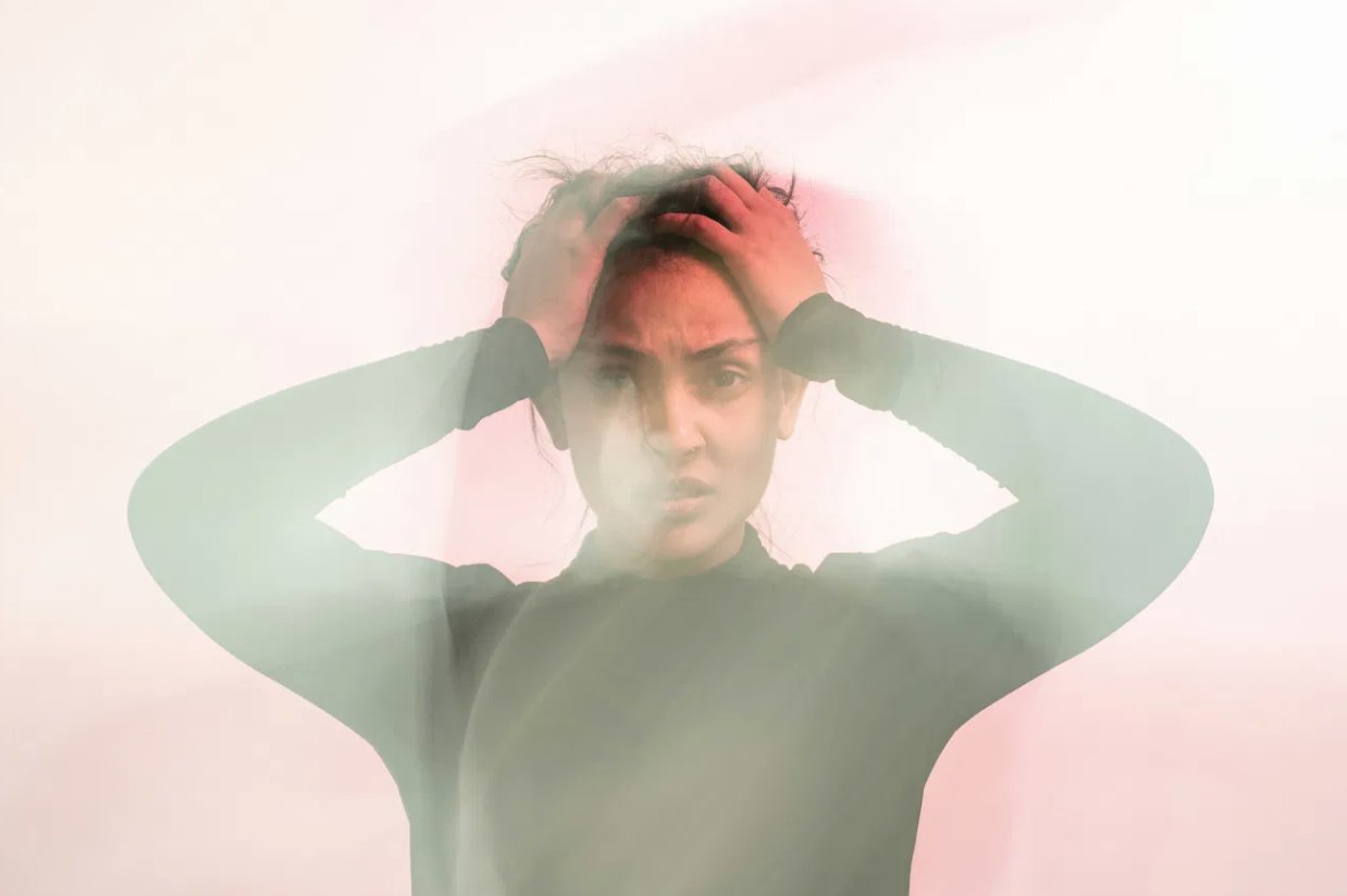 Woman experiencing anxiety and overwhelm