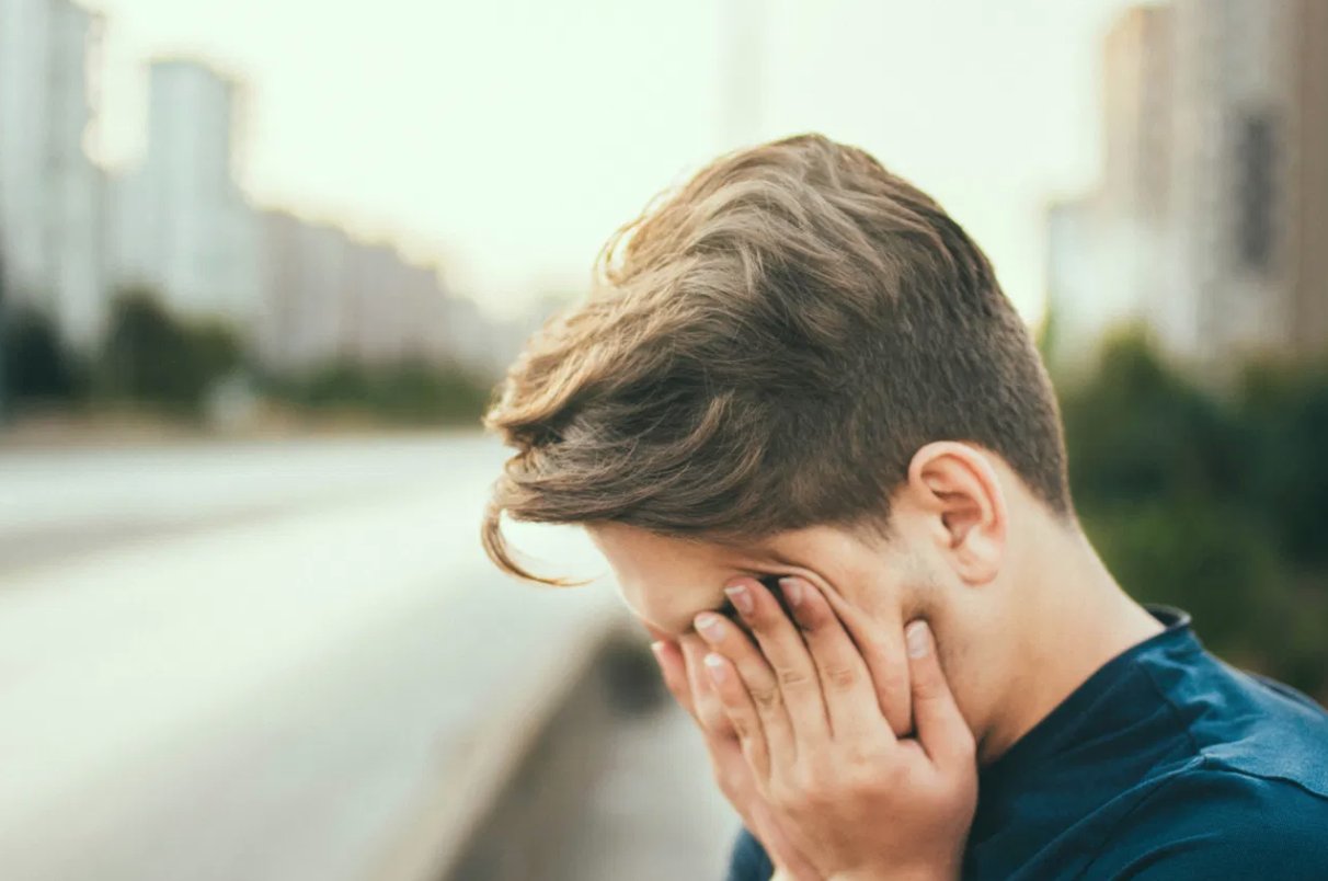 Man experiencing exhaustion and burnout